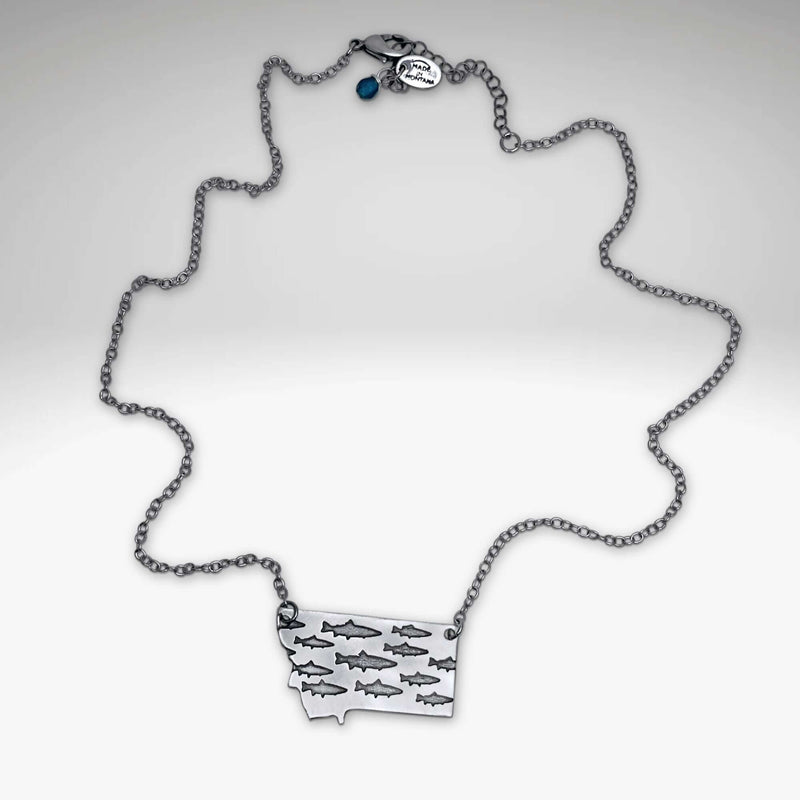 Fishing In Montana Necklace showcasing trout on state outline with adjustable chain options, perfect for outdoor enthusiasts.
