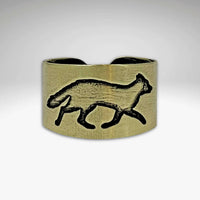 Fox Run Adjustable Ring in antique brass with a fox design, handmade in Montana.