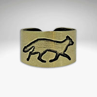 Fox Run Adjustable Ring in antique brass with a fox design, handmade in Montana