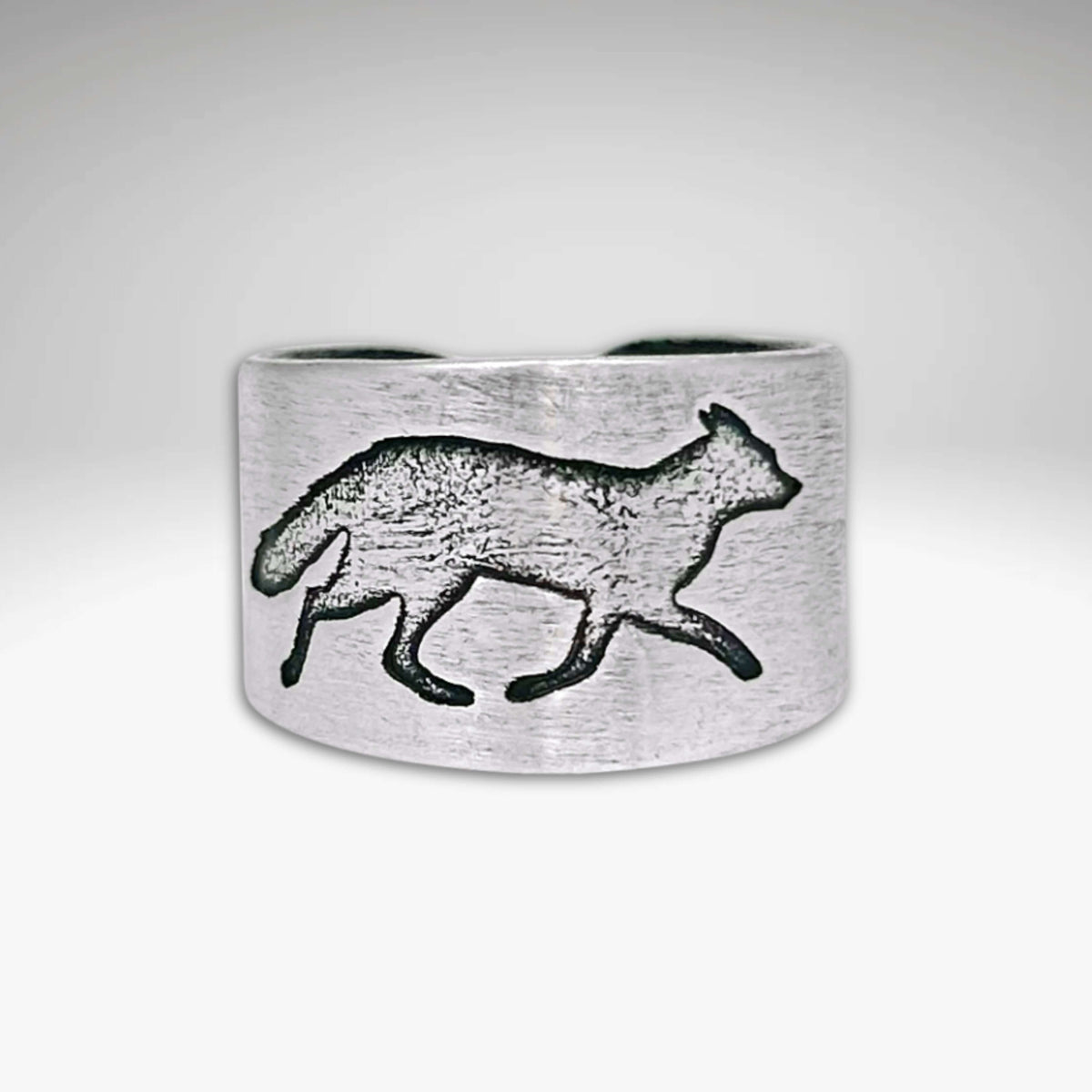 Fox Run Adjustable Ring in matte silver with fox design, handmade in Montana, 