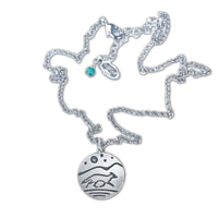 Fox Run Necklace featuring a handcrafted pendant of a running fox and night sky elements in matte silver finish.
