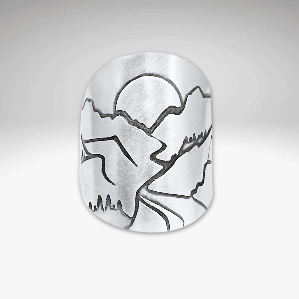 Going to the Sun Road Adjustable Ring showcasing etched landscapes of Glacier National Park.