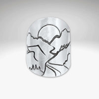 Going to the Sun Road Adjustable Ring showcasing etched landscapes of Glacier National Park.