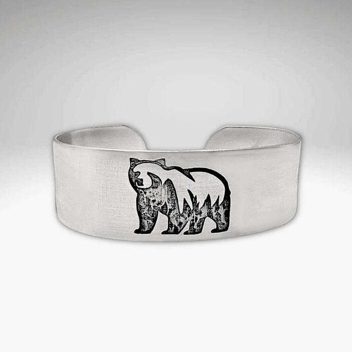 Griz Cuff Bracelet featuring a grizzly bear silhouette, perfect for nature lovers and adventure seekers.