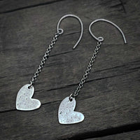 Heart Drop Earrings featuring hand-hammered asymmetrical hearts on sterling silver earwires.