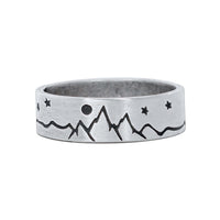 High Alpine Mountain Ring in matte silver featuring mountain and star designs.