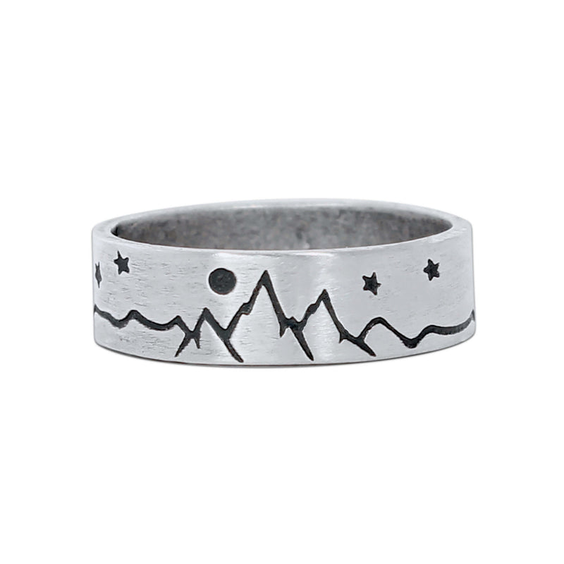 High Alpine Mountain Ring in matte silver featuring mountain and star designs.