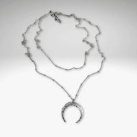 Horned Moon Necklace on satellite chain in matte silver with layered chains, elegant jewelry for any style.