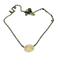 Little Dipper Necklace featuring seven stars of Ursa Minor constellation in antique brass finish.