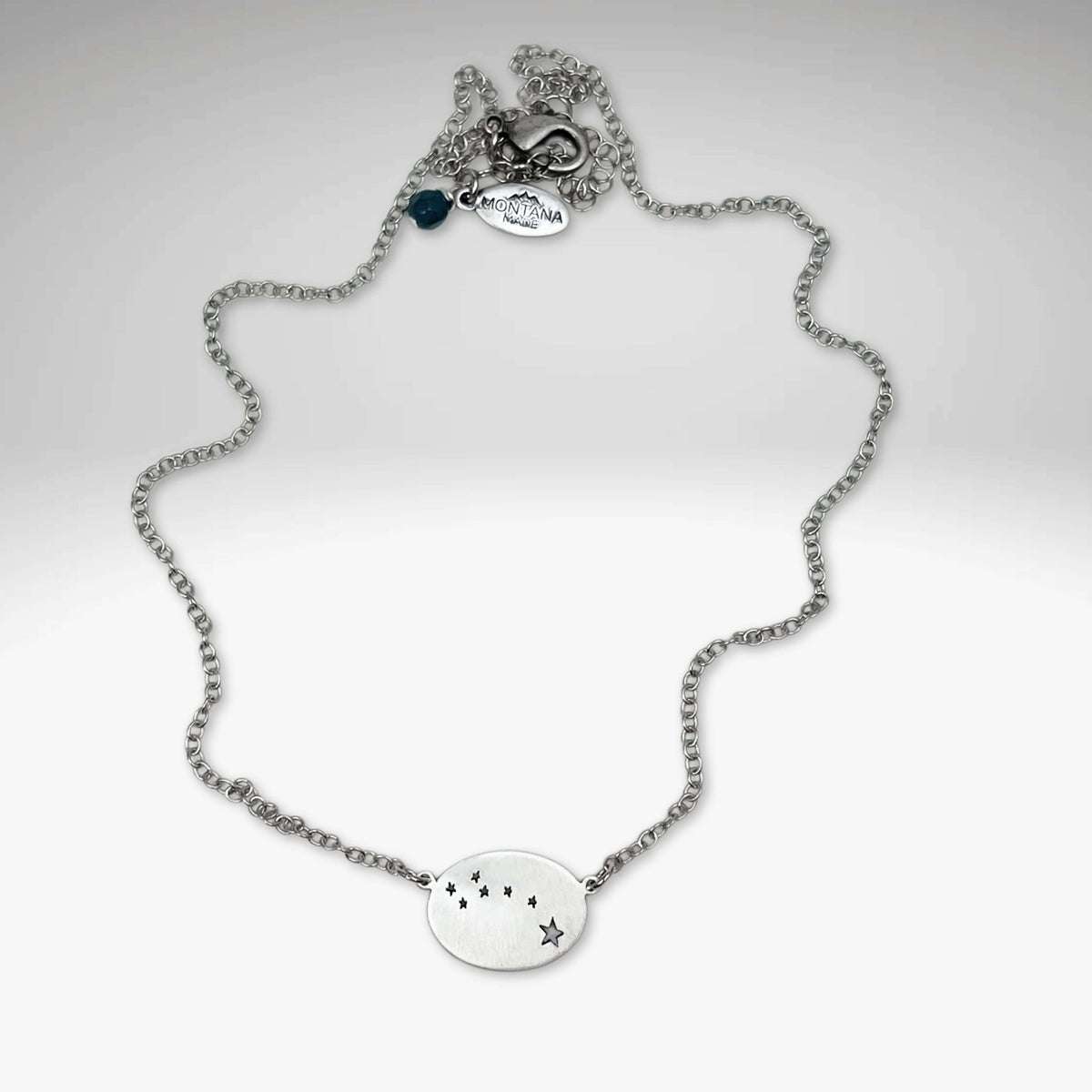 Little Dipper Necklace in Matte Silver finish featuring seven stars of the Ursa Minor constellation.