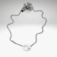 Little Dipper Necklace in Matte Silver finish featuring seven stars of the Ursa Minor constellation.