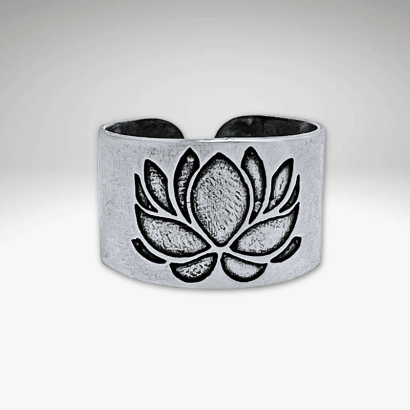 Lotus Adjustable Ring showcasing a beautifully etched lotus design in matte silver finish.