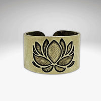 Lotus Adjustable Ring in antique brass featuring an intricate etched lotus design.