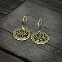 Lotus Flower Earrings in antique brass finish showing delicate lotus design on circular charm.