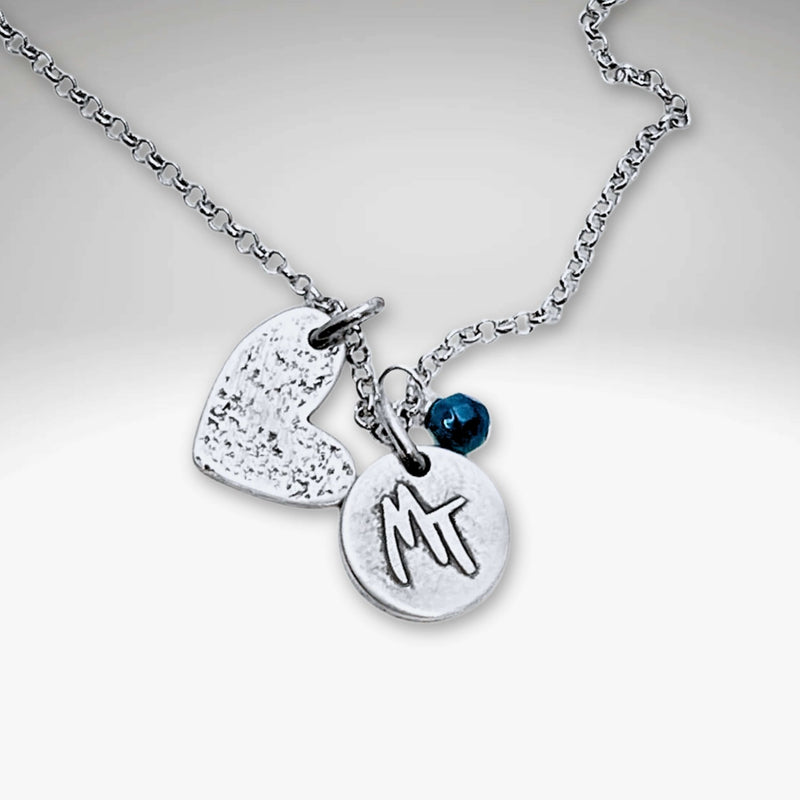 Love Montana Necklace featuring a light hammer finish, MT engraving, and heart charm in Matte Silver.