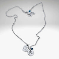 Love Montana Necklace featuring a light hammer finish with delicate MT engraving and blue accents, available in Matte Silver.