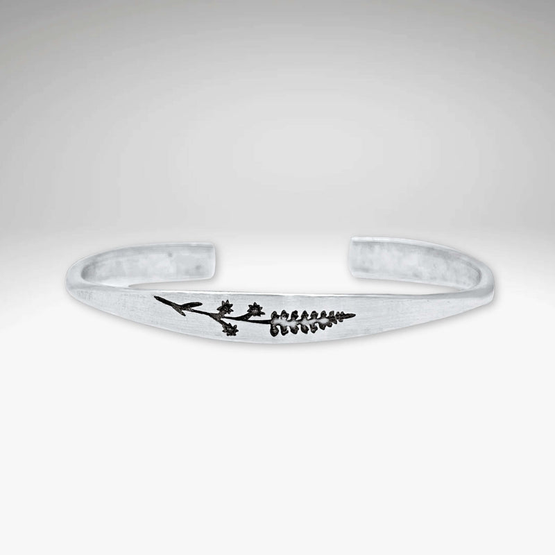 Lupine Flower Cuff Bracelet featuring a delicate lupine design on a signet cuff, perfect for everyday wear.