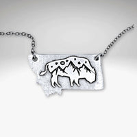 Montana High Alpine View necklace featuring bison and mountain peaks in a Montana silhouette.