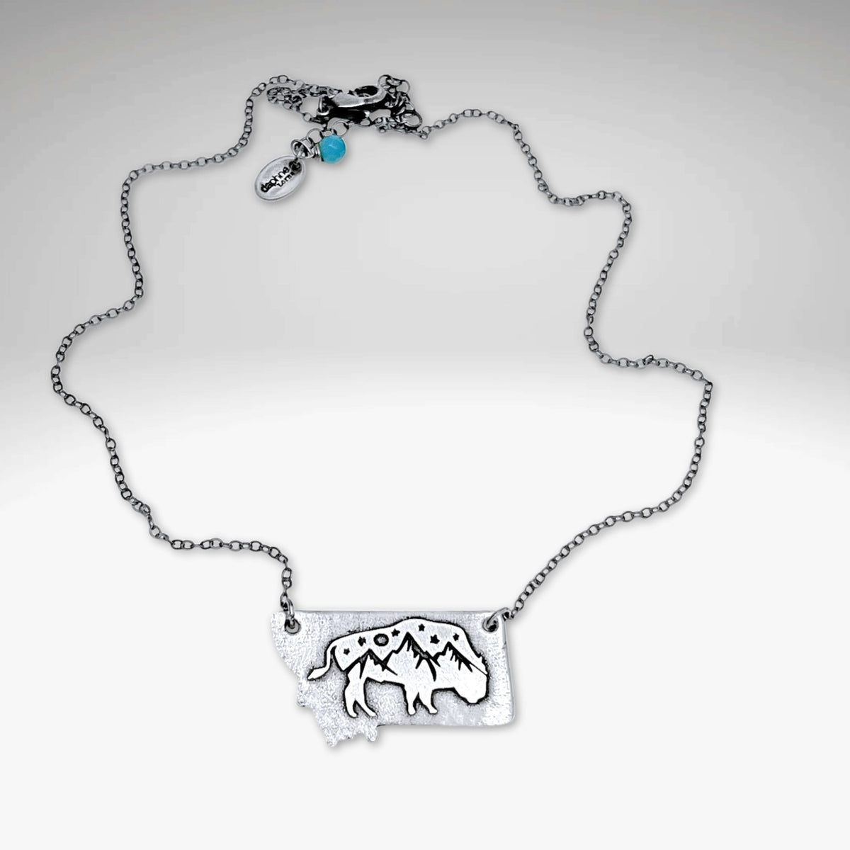 Montana High Alpine View necklace with mountain peaks and bison silhouette on a silver chain.