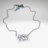 Montana High Alpine View necklace with mountain peaks and bison silhouette on a silver chain.