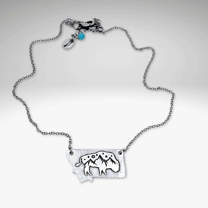 Montana High Alpine View necklace with mountain peaks and bison silhouette on a silver chain.