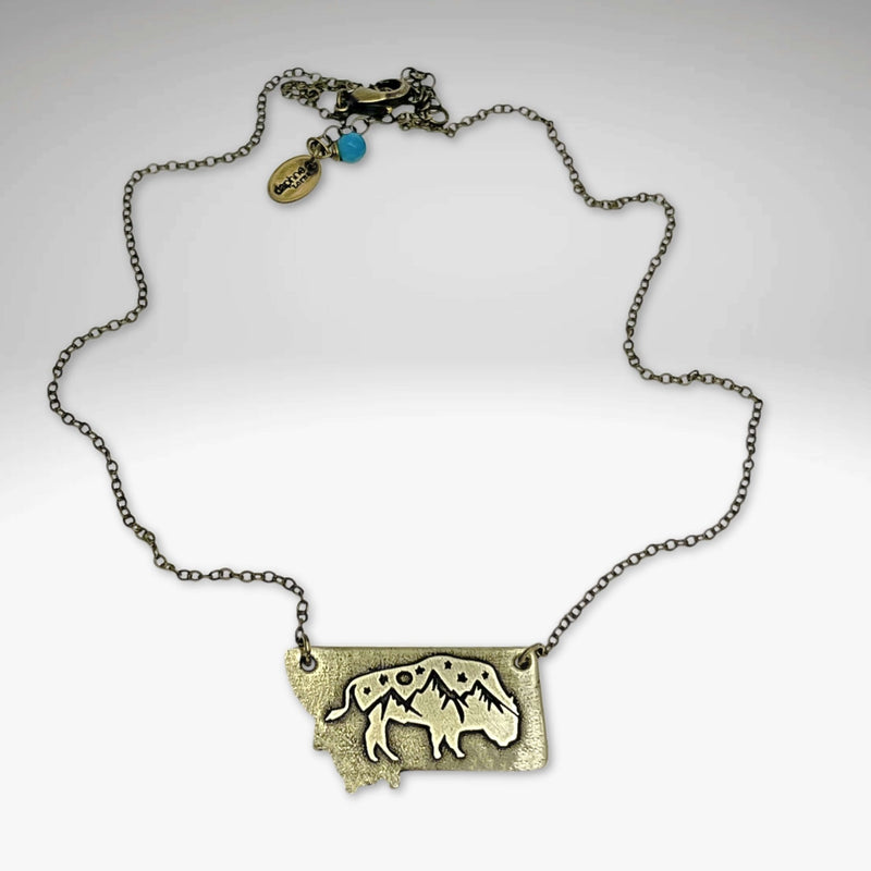 Montana High Alpine View necklace featuring mountain peaks and bison in Montana silhouette, available in two finishes.