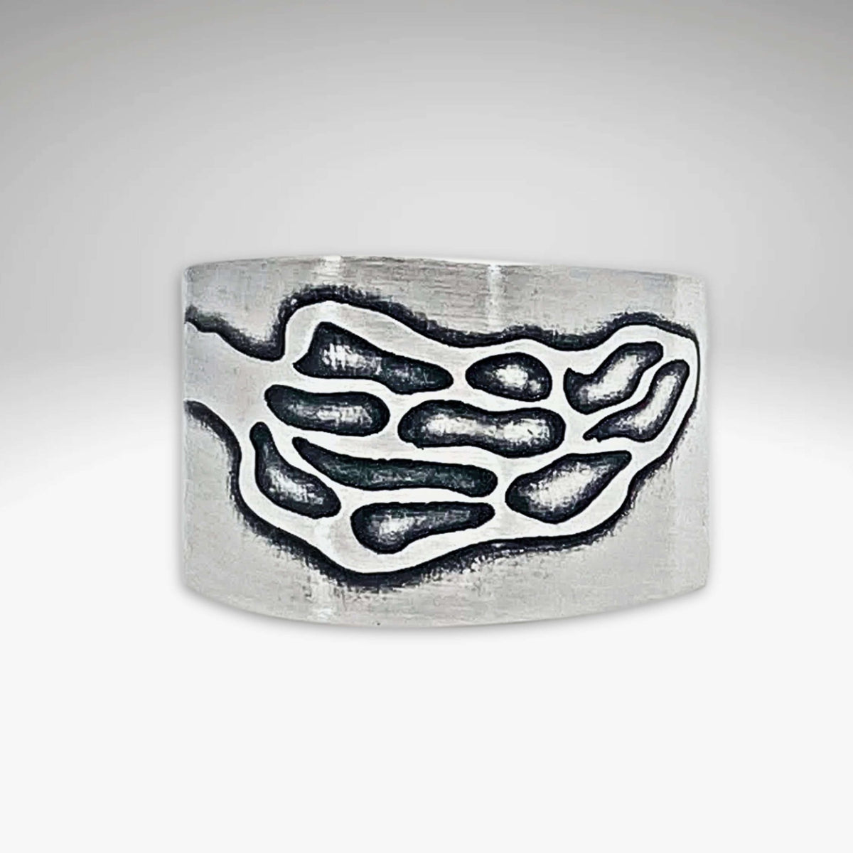 Morel Adjustable Ring showcasing an etched Morel design in Matte Silver finish.