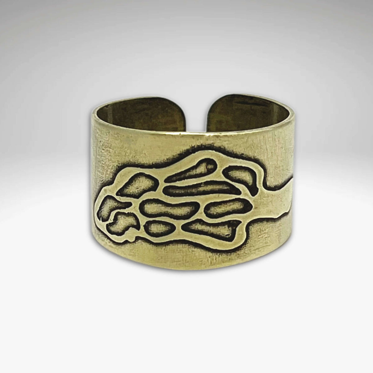 Morel Adjustable Ring in Antique Brass finish showcasing an etched Morel design, symbolizing hope and the beauty of foraging.