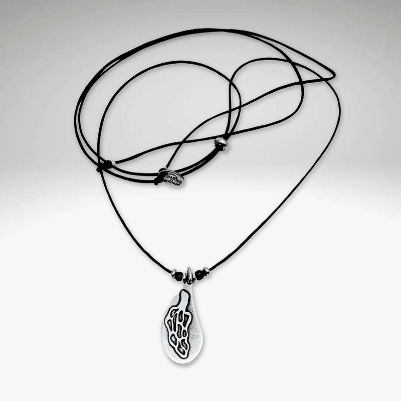 Morel Mushroom Necklace showcasing an intricately etched morel pendant on a stylish cord.
