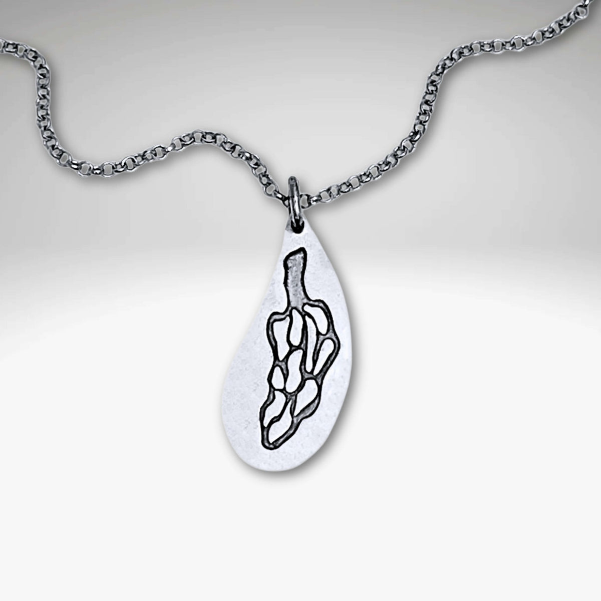 Morel Mushroom Necklace featuring an etched morel pendant on a silver rolo chain.
