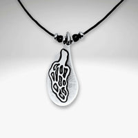Morel Mushroom Necklace featuring an etched design on a pendant with black cord.