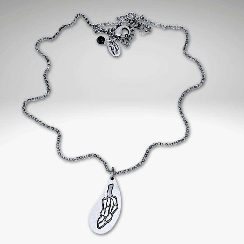 Morel Mushroom Necklace featuring an intricately etched morel pendant on a delicate chain.
