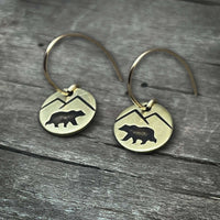 Mountain Bear Earrings showcasing etched bear and mountain design on raw brass for nature lovers.