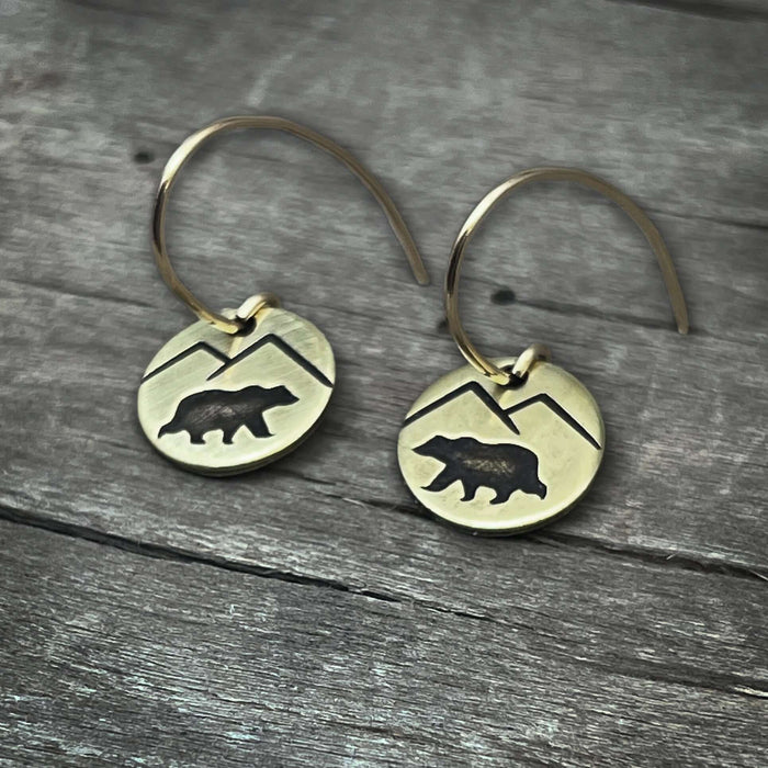Mountain Bear Earrings showcasing etched bear and mountain design on raw brass for nature lovers.
