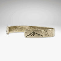 Mountain Peaks Cuff Bracelet showcasing mountain peaks detail on a handmade cuff, perfect for outdoor adventure enthusiasts.