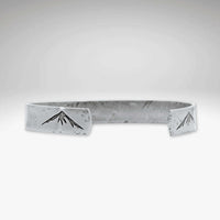 Mountain Peaks Cuff Bracelet showcasing mountain peaks design, handmade cuff perfect for outdoor enthusiasts.