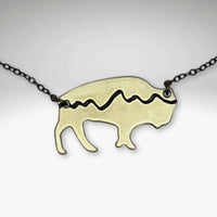 Mountains on Buffalo Necklace featuring a bison design with etched mountain silhouette on a rolo chain.