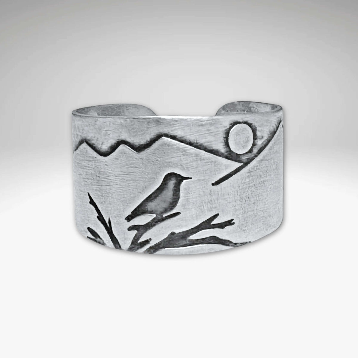 Mtn Bluebird Adjustable Ring featuring a mountainscape and etched bluebird in a beautiful silver finish.