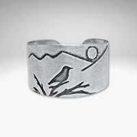 Mtn Bluebird Adjustable Ring featuring a mountainscape and etched bluebird in a beautiful silver finish.
