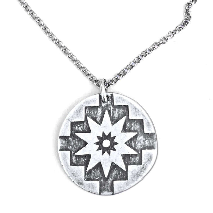 Northstar Necklace featuring a silver pendant with star design on an adjustable chain.