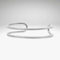 Open Space Cuff Bracelet in matte silver finish, showcasing a sophisticated and feminine design.