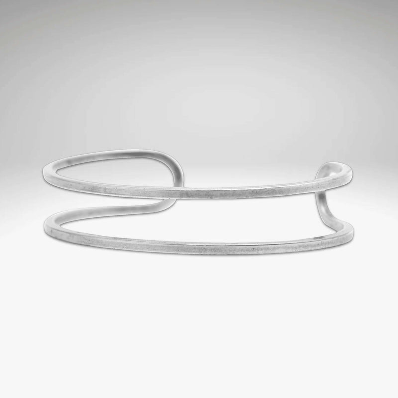 Open Space Cuff Bracelet in matte silver finish, showcasing a sophisticated and feminine design.