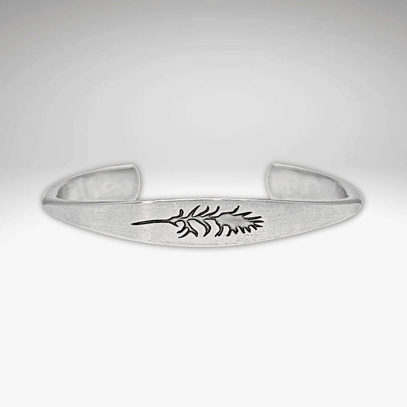 Paintbrush Signet Cuff in matte silver finish showcasing a unique leaf design, handcrafted in Montana.