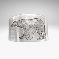 Polar Bear Cuff crafted from raw brass with etched polar bear design, textured for realism and uniqueness.