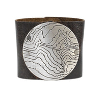 Rising Wolf Disk Leather Cuff with topographical design in classic Espresso leather, featuring a matte silver finish.
