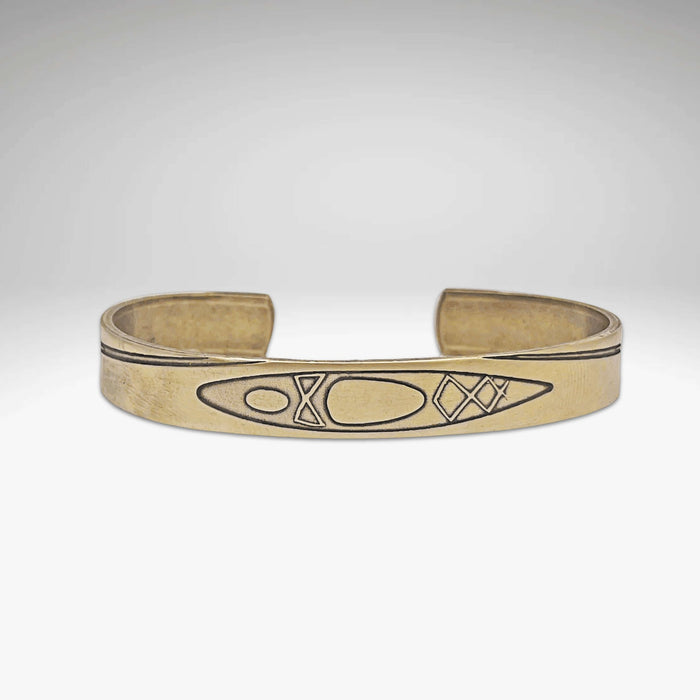 River Run Kayak Cuff Bracelet showcasing an acid-free etching design in antique brass finish.
