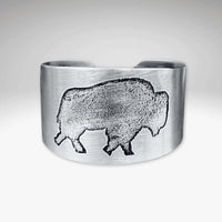 Stylish Roam Free Cuff in Matte Silver featuring a buffalo design, celebrating nature and freedom.