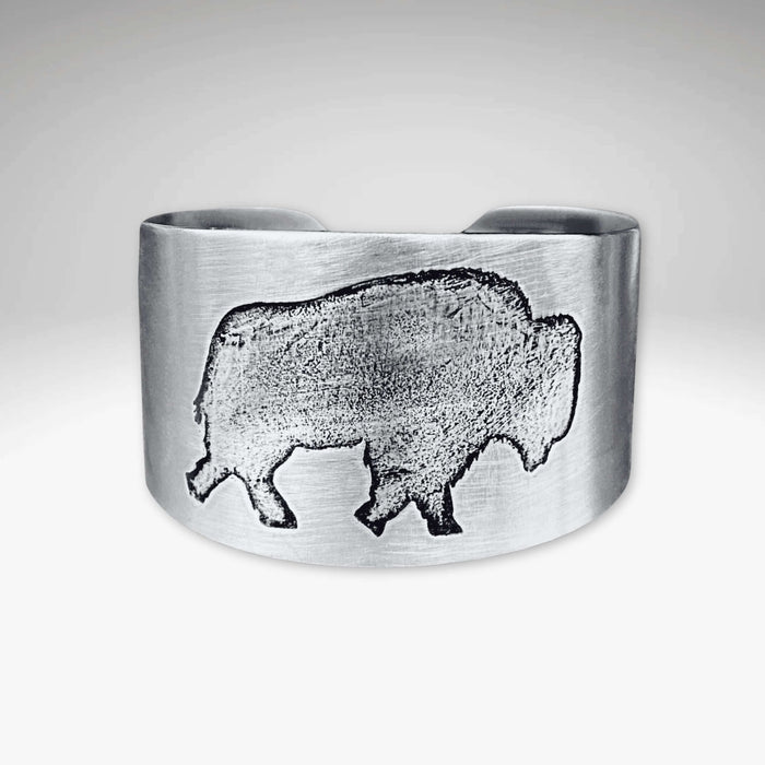 Stylish Roam Free Cuff in Matte Silver featuring a buffalo design, celebrating nature and freedom.