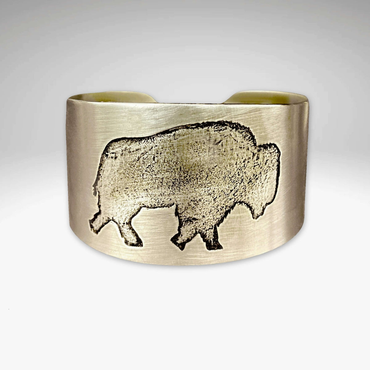 Stylish Roam Free Cuff featuring a buffalo design in matte silver finish, symbolizing admiration for nature.