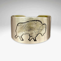 Stylish Roam Free Cuff featuring a buffalo design in matte silver finish, symbolizing admiration for nature.